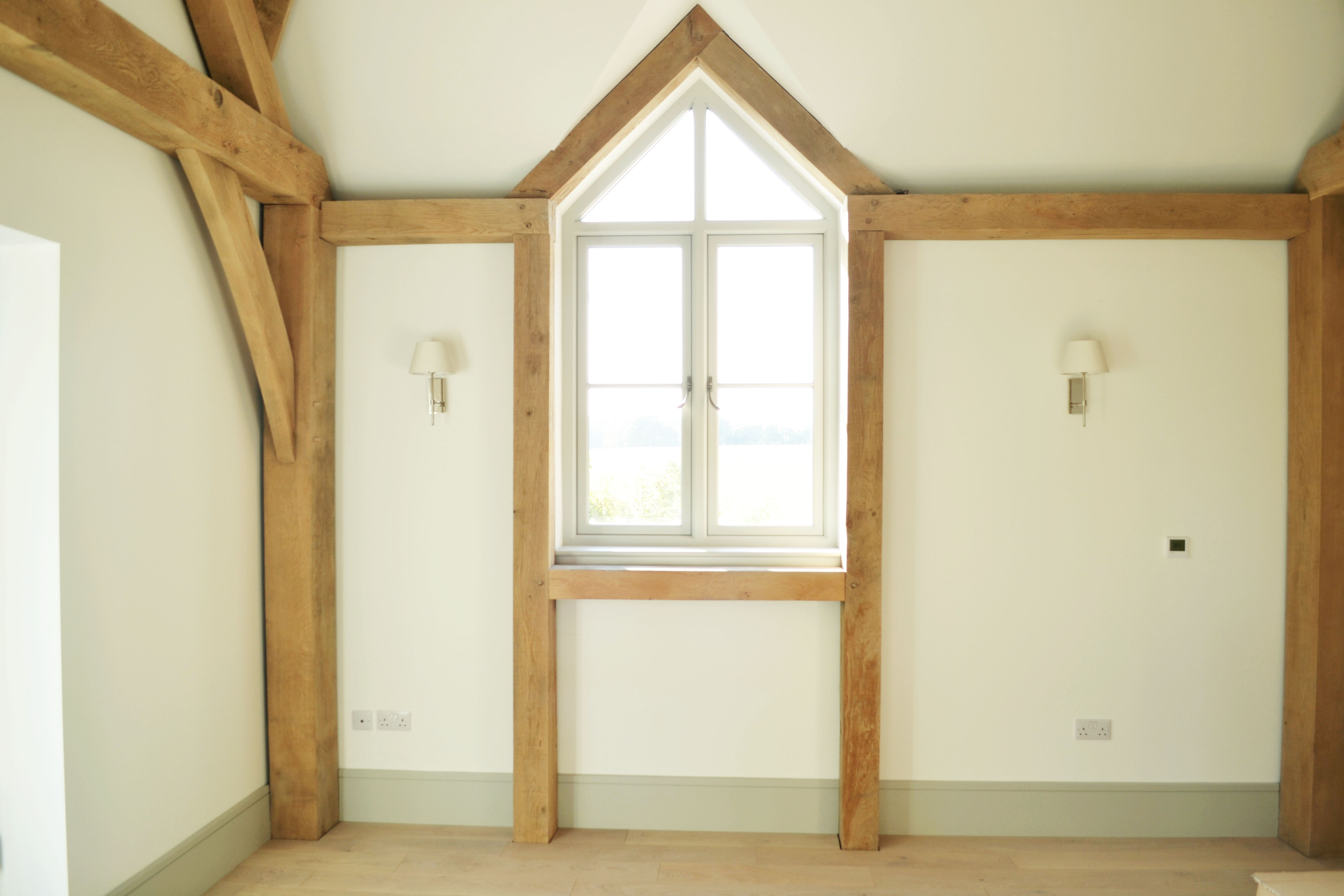 Oak frame bedroom with apex window